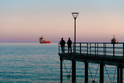 Silhouette of people on the pier during sunset - 9251.pics