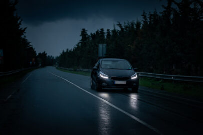 A lone car on a rural road at night - 9251.pics